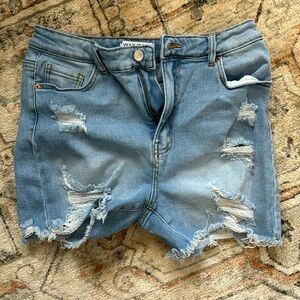 Light blue ripped jean shorts